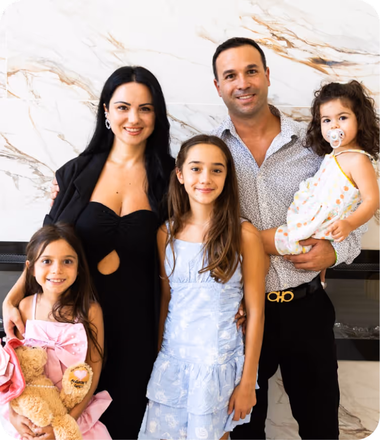 Kostika Xhurka, owner and founder of Vegas Home Buyers, with his family